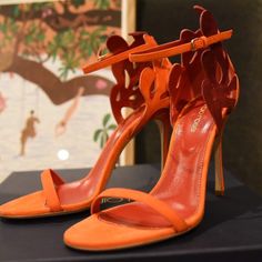 Beautiful Sergio Rossi Matisse Sandal In Red (Orange). All Suede, Made In Italy, Buckle Clasp, Adorned With Matisse Cutout Style Leaves. Tried Them On Inside The House And Left A Small Scuff On The Bottom Of One Sole (But Were Too Big) And Are Otherwise Unworn. In Original Box And Protective Shoe Bags Size 37.5 It Us 7.5 Orange Evening Sandals For Summer, Summer Cocktail Heels With Red Sole, Orange Open Toe Evening Sandals, Elegant Orange Heels For Summer, Elegant Orange Summer Heels, Luxury Orange Sandals With Removable Insole, Designer Orange Sandals With Round Toe, Luxury Orange Evening Sandals, Elegant Orange Sandals For Summer