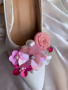 KerryParkerStore's Berries & Blush Shoe Clips <3 Set of 2 stainless steel base shoe clips/ 1 Pair Berries and Blush Don't miss out on the chance to give your heels a makeover like never before! With an extra hint of love, thanks to its blush palette. Handcrafted florets of sequence and fabrics, embedded with crystals and beads for fine detailing. A palette that is enriched with lovely hues like rouge, flamingo, metallic pink, coral and fuchsia and embellished with huge pearls and gemstone Elegant Pink Wedding Shoes For Bridal Shower, Elegant Pink Shoe Clips For Party, Floral Bridal Shoes, Blush Shoes, Colorful Gift Wrapping, Hot Pink Heels, Bridal Shoe, Heel Accessories, Wedding Gloves