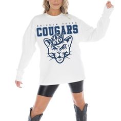 Embrace BYU Cougars spirit in ultimate comfort with this Gameday Couture Big Goals Long Sleeve T-Shirt. The oversized fit and dropped shoulders create a casual, comfy look that's perfect for game day or any day. Plus, the midweight fabric makes it ideal for layering as the weather cools down. Collegiate Oversized Top With Graphic Print, Oversized Collegiate Long Sleeve Top, Oversized Collegiate Top With Graphic Print, Oversized Long Sleeve Collegiate Tops, Fall School Spirit Relaxed Fit Tops, Oversized School Spirit Graphic Sweatshirt, Oversized School Spirit Sweatshirt With Graphic Print, Oversized Graphic Print Sweatshirt For School Spirit, Oversized Tops For School Spirit In Fall