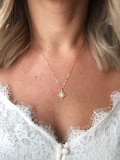 "This is a stunning piece that will catch anyone's eye. Makes a beautiful gift or great for everyday wear and layering MATERIAL: -14K Gold Filled (all components of necklace) -Measurement : 17mm X 13mm -CZ stones and white opal stone in center -Lead Free & Cadmium Free & Nickel Free Model is wearing 18\" length All orders come packaged ready for gifting! Order also comes with a, Jewelry Care Instruction Card. MADE TO ORDER Handmade with Love ►WHAT IS 14K GOLD FILL? 14k gold fill is a gen Dainty Star-shaped Gold Necklace, Dainty Gold Star Necklace, Elegant Starburst Necklaces For Gifts, Elegant Starburst Jewelry As Gift, Elegant Star Of David Jewelry For Wedding, Elegant Starburst Jewelry Gift, Elegant Star Of David Wedding Jewelry, Gold Dainty Jewelry With Star Charm, Gold Starburst Necklace With Star Charm