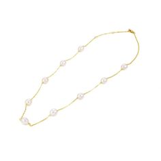 PRICES MAY VARY. Indulge in timeless elegance with our 14k Solid Gold Cultured Pearl Station Necklace, Bracelet, and Earring Series. This exquisite jewelry collection is designed to offer a touch of sophistication and luxury, perfect for any occasion. Crafted from high-quality 14k solid gold, this necklace features lustrous 6.5-7mm cultured pearls meticulously spaced along a delicate chain. The pearls' natural beauty is complemented by the gold's rich, warm hue, creating a piece that is both cla Elegant Gold Round Pearl Necklace, Classic Single Strand Pearl Necklace In 14k Gold, Single Strand 14k Yellow Gold Jewelry, Classic 14k Gold Clavicle Chain Jewelry, Classic Gold Single Strand Pearl Necklace, Yellow Gold Single Strand Round Jewelry, Classic 14k Gold Pearl Necklace, Round Yellow Gold Single Strand Jewelry, Classic Yellow Gold Jewelry With Clavicle Chain