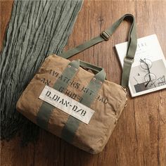 Overview： Design: Green Canvas Military Duffle Bag Pilot Bag Canvas Military Bag Army Style Carrier Bag for MenIn Stock: Ready to Ship (2-4 days)Include: Only BagCustom: NoColor: Army Green, KhakiLeather:, CanvasMeasures: L: 50cm x 33cm x 21cm S: 38cm x 30cm x 14cmWeight: 0.75kgSlots: 1 zipper slot, 1 pad slot, 1 book slot, Accessories(option): NoneStyle: Green Canvas Military Duffle Bag Pilot Bag Canvas Military Bag Army Style Carrier Bag for MenVery durable (At least 5 Years) and it should las Vintage Laptop Bag With Large Capacity For Travel, Vintage Large Capacity Briefcase For Everyday Use, Vintage Khaki Bag With Adjustable Strap, Vintage Large Capacity Shoulder Bag For Outdoor, Vintage Large Capacity Laptop Bag, Vintage Large Capacity Shoulder Briefcase, Vintage Khaki Bags For Daily Use, Vintage Khaki Satchel For Daily Use, Vintage Canvas Bag With Large Capacity For Outdoor