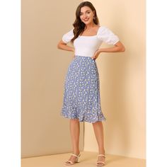 Through the summer seasons in this effortlessly chic flowy skirt. In a midi silhouette that wraps around, this skirt exudes the spring-summer feel you can't wait for. Sitting high on the waist, the light and breezy fabric trimmed with ruffles falls to a split skirt for impact and movement as you walk. Cut in a flared shape, this skirt is designed with a button closure at the side flattering for showing your looming legs. Adding a beautiful floral flourish for feminine appeal, this style is a fus