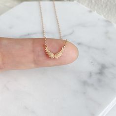 Dainty Angel Wing Sterling Silver Necklace Features: Material: 92.5 Sterling Silver, 14k gold plated over Sterling silver, 14k Rosegold plated over Sterling silver Pendant Size: 10mm(W) x 7mm(H) Necklace Length: 15 inch Ready for a Gift 🎁 H Necklace, Angel Wing Necklace, Wing Necklace, Necklace Minimalist, Keep Jewelry, Minimalist Necklace, Necklace Length, Pure Silver, Sterling Silver Necklaces