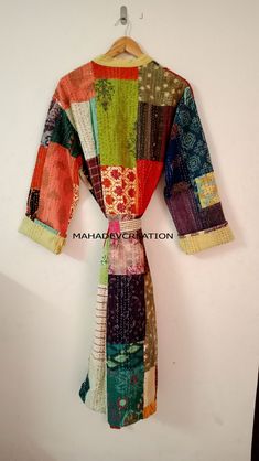 "hello guys shrimahadevcreation presenting A gorgeous and stunning new kimono in a deep colour that is sure to brighten up your day. perfect for any occasion: casual or an event, weekend lounging, resort wear or even as a coat/jacket. beautiful new kantha jacket. Buy it for the holidays! Looks fabulous over a long silk tank dress or palazzo pants. Or wear it with jeans and boots. We will provide you a matching color string to close this jacket which gives it awesome look. Wear it with any black Multicolor Patchwork Kimono For Festivals, Green Traditional Kimono With Patchwork, Traditional Green Kimono With Patchwork, Vintage Multicolor Patchwork Kimono, Multicolor Cotton Kimono With Patchwork, Multicolor Cotton Patchwork Kimono, Multicolor Cotton Kimono For Home, Long Sleeve Patchwork Kimono For Festivals, Quilted Kimono