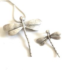 Need a reminder to be free? This beautiful dragonfly necklace is perfect to remind you to be full of love and admiration for nature. There are two sizes of the dragonfly pendant. The larger one is 42 mm by 40 mm, and the smaller one is 28 mm by 26 mm. You can purchase the PENDANT ONLY or the pendant with a necklace of your choice. Just use the pull down menu. The rustic charm is silver plated brass. This is a perfect gift for someone you love or for yourself (this is self-love)! Adjustable Dragonfly Necklace For Gifting, Adjustable Dragonfly Necklace For Gift, Nickel Free Adjustable Dragonfly Necklace, Handmade Dragonfly Necklace For Gifting, Handmade Dragonfly Necklace For Gift, Beautiful Dragonfly, Dragonfly Necklace, Dragonfly Pendant, Repurposed Jewelry