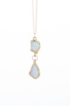 -Genuine Raw Australian Opals-10-15mm in size-2-2.5 inch drop-14k Gold Filled Chain-Opals 24k Gold Dipped for Bright Gold Coloring-16"-20" Chain length optionsHave a preference on the color of your opal? Please let us know in the special instructions section of the order - we will do our best to meet any requests! These opals do range from white with rainbow flash to deep blue. Opals tend to shift colors depending on the light and the angle you view. I cannot guarantee any specific hues will be Teardrop 14k Gold Jewelry With Natural Stones, 14k Gold Teardrop Jewelry With Natural Stones, Gold Teardrop Pendant Jewelry With Stones, Gold Teardrop Pendant With Stones Jewelry, Gold Teardrop Pendant With Stones, 14k Yellow Gold Jewelry With Large Stone, Opal Drop Gemstone Jewelry, Yellow Gold Opal Teardrop Pendant Necklace, Yellow Gold Teardrop Opal Necklace