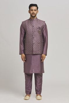 Purple bundi with thread embroidered peacock patterns and sequin work embellishments. Comes with inner kurta and pant. - Aza Fashions Festive Designer Wear Chanderi Nehru Jacket, Festive Chanderi Nehru Jacket For Designer Wear, Chanderi Nehru Jacket For Designer Wear And Festive, Diwali Nehru Jacket With Resham Embroidery For Reception, Navratri Chanderi Bandhgala With Dori Work, Designer Nehru Jacket With Dori Work For Navratri, Elegant Chanderi Nehru Jacket With Pallu, Navratri Designer Nehru Jacket With Dori Work, Navratri Embroidered Raw Silk Nehru Jacket