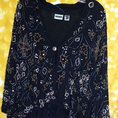 Gorgeous! Chicos Brand Black Mesh Material Under Beautifully Embellished & Embroidered Top Layer. One Button Front. Wide 3/4 Sleeves. Perfect Over The Black Cocktail Dress Or Elegant Evening Pants. No Low-Ball Offers On This Beauty Accepted As They Will Be Automatically Declined. Thank You. Embellished Long Sleeve Cardigan For Fall, Winter Embellished Long Sleeve Cardigan, Embellished Long Sleeve Cardigan For Winter, Long Sleeve Embellished Cardigan For Winter, Fitted Long Sleeve Holiday Cardigan, Fitted Holiday Cardigan, Embellished Long Sleeve Cardigan, Long Sleeve Sequined Evening Cardigan, Black Embroidered Long Sleeve Cardigan