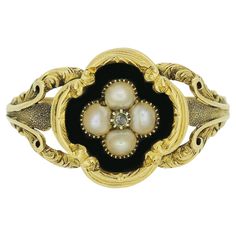 This is a wonderfully hand made yellow gold Victorian mourning ring. The ring is set with a central rose cut diamond in a cut collet setting and is surrounded by four original natural pearls in a quatrefoil shaped face. The inside of the ring is inscribed with the words 'In Loving Memory Of My Dear Husband' and the back features a locket compartment. Condition: Used (Very Good) Weight: 2.7 grams Face Dimensions: 13.5mm x 13mm Pearls: 4 (2.75mm) Diamond: 1 (1mm) UK Ring Size: S Hallmarked: Yes, London 1835 Maker's Mark: ED Period: Victorian Box: The Vintage Jeweller Gift Box Bohemian Style Rings, Face Dimensions, Dear Husband, Locket Ring, Vintage Things, Gothic Wedding, La Face, Loving Memory, Pearl Diamond