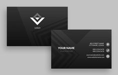 two black business cards with the letter v on them