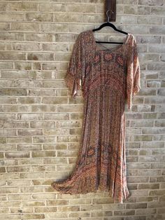 🌾gorgeous boho dress  Elastic waist with tie  🌾label: J Gee  Tag size: 2x  Care: machine wash  Content: rayon  No stretch  Bust:58" Waist:35-54" Hip:82" Length:53" 🌾great condition Bohemian Patterned Maxi Dress With Boho Print, Patterned Bohemian Dress, Bohemian Maxi Dress With Vintage Print, Bohemian Patterned Flowy Maxi Dress, Bohemian V-neck Dress With Vintage Print, Bohemian Multicolor Dress With Vintage Print, Multicolor Bohemian Dresses With Vintage Print, Vintage Boho Printed Dress For Vacation, Flowy Printed Bohemian Dress