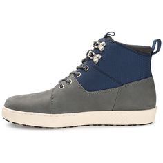 The Wasatch sneaker boot from Territory is certain to become your new go-to. Genuine leather materials with two-tone embellishments shape this high-top design, which is supported by a flexible yet durable EVA/rubber hybrid outsole. A lace-up fastening ensures a secure fit, while an 8 mm Tru Comfort Foam™ insole with a padded collar provides superior support. Blue High-top Sneakers For Walking, Blue High-top Sneakers With Studded Outsoles, Laced High-top Sneakers For Hiking, Blue Leather Outdoor Sneakers, Blue High-top Hiking Sneakers, Blue High-top Sneakers For Outdoor With Round Toe, Blue High-top Sneakers With Studded Rubber Outsoles, Blue Leather Sneakers For Outdoor Activities, Sporty Hiking Sneakers With Rubber Toe Cap