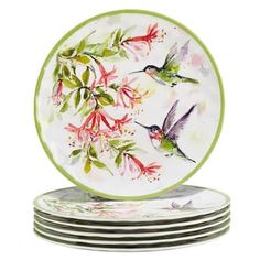 four plates with hummingbirds and flowers on them