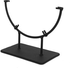 a black metal stand with two hooks on it