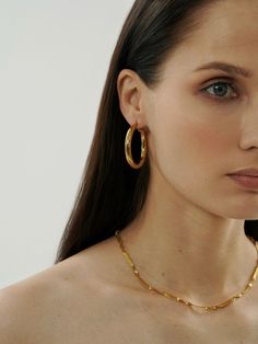 Embrace timeless elegance with our Chunky Gold Hoops. Crafted for those who adore minimalist jewelry, these thick huggie hoops are the quintessential addition to any outfit. Timeless Small Hoop Earrings For Everyday, Everyday Elegance Minimalist Hoop Huggie Earrings, Timeless Hoop Earrings For Everyday Luxury, Timeless Hoop Earrings For Everyday Elegance, Timeless Small Hoop Tarnish Resistant Earrings, Timeless Elegant Hoop Earrings, Timeless Huggie Hoop Earrings For Everyday, Chic Everyday Hoop Huggie Earrings, Timeless Everyday Hoop Earrings