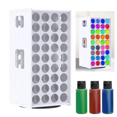 an array of different colors and shapes in a white box with four bottles next to it