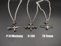 Are you a fan of fighter planes? Do you love the thrill of flying high in the sky? Or do you know someone who does? If so, you will love these fighter jet necklaces! These necklaces are handmade with love and care, featuring miniature replicas of real fighter jets. You can choose from seven different models: T6 Texan, P51 Mustang, C130 Hercules. Each pendant is made from high-quality materials and has a stunning level of detail. You can see the wings, the cockpit, the engines, and even the tail number! These necklaces are not only beautiful but also meaningful. They are a perfect way to show your passion for aviation or your support for the military. They are also a great gift idea for fighter jet pilots, military personnel, airman or their families. Whether it's for a birthday, an anniver Gifts For Pilot, Air Force Birthday, C130 Hercules, Plane Necklace, Cowboy Jewelry, Pilot Costume, Hot Biker Guys, Funny Patches, Scale Model Kits