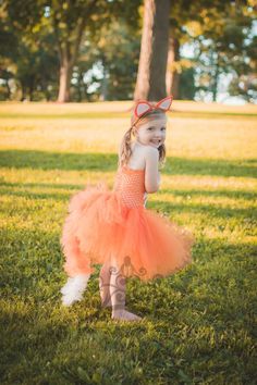 "Fox Tutu Dress An unlined orange crochet tutu top embellished with white felt detail, a full orange tutu, and a tulle \"tail\" attached to the back. Fox ears can be added through the drop down menu. Sizes and Lengths: (Tail will be longer) 0-6 Months Length - 6 Inches 6- 12 Months Length - 7 Inches 12M - 2T 8 inch length 3T - 4T 10 inch length 5 - 6 12 inch length 7 - 8 14 inch length 8/10 14 inch length 10 - 12 14 inch length 12 - 14 14 inch length Perfect for gift giving, dress up, photo prop Kids Fox Costume, Fox Halloween Costume, Fox Halloween, Halloween Costume Kids, Crochet Tutu, Girls Tulle Skirt, Twin Halloween, Animal Halloween Costumes, Fox Costume