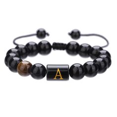 PRICES MAY VARY. Handcrafted Design: Initials bracelets feature natural black onyx and tiger eye stone beads, handmade with braided rope for a unique look. Adjustable Fit: The bracelet's adjustable design ensures a comfortable fit for most wrist sizes. Durable Construction: Crafted with high-quality materials for long-lasting wear. Stylish Accessory: These bracelets add a touch of rugged style to any casual or formal outfit. Versatile Choice: Suitable for men of all ages, making a great gift for Initial Bracelets, Braided Rope Bracelet, Rope Bracelets, Rugged Style, Braided Rope, Initial Bracelet, Beads Handmade, Tiger Eye Stone, Black Agate