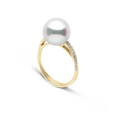 The gracefully curved solid gold and diamond band elegantly supports the lustrous 10.0-11.0 mm White South Sea pearl. Primarily grown in pristine, remote regions of the Northwestern Australia, white South Sea pearls come from a special type of pearl oyster known as the silver-lip. These large oysters produce the world's largest and most valuable pearls of 100% natural color. Elegant Rings With Pave Setting, Elegant Yellow Gold Ring With Akoya Pearl, Elegant Yellow Gold Rings With Timeless Design, White Diamond Jewelry With Timeless Design, Elegant Pearl Ring With Pave Setting For Anniversary, Elegant Pearl Ring With Single Cut Diamonds, Elegant White Rings With Diamond Accents, Elegant Formal Yellow Gold Diamond Ring, Elegant Yellow Gold Diamond Ring For Formal Occasions