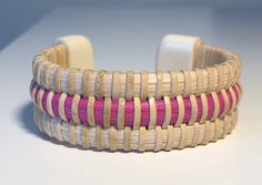 3/4” Nantucket bracelets made in the Lightship basket weaving style. Natural cane and weavers with Acrylic end caps.Color choices are beach rose pink, sea foam, hot pink, purple or teal.Price includes shipping and bracelet gift box. For orders of 3+ bracelets, please contact me for discounted pricing.Sizing - (Measurements from end to end and are approximate)Extra Small - 4 3/4"Small - 5 1/4"Materials: cane,weaver Lightship Basket, Beach Rose, Bracelet Gift Box, Pink Sea, Nantucket, Sea Foam, Rose Pink, Bracelet Gift, Basket Weaving