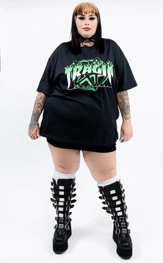 Show your allegiance in this rad oversized shirt designed exclusively for Tragic Beautiful by @brydiebrutal. Bringing us back to our emo roots with a hint of sk8r boi vibe thrown in too. Available in sizes XS-5XL. We have other sizes available here. These shirts are designed to be oversized for max comfort. Check the sizing chart for measurements or feel free to contact us for more assistance. Model is wearing a size 3XL. Made from high-quality fabric and screen printed with care. We produce ethically by building relationships with small businesses here and overseas that fit our ethical framework. Fabric: 50% cotton and 50% polyester which has a slight stretch for a flattering and comfortable fit. Care Instructions: Machine wash 30°c. Do not bleach. Do not tumble dry. Iron at low temperatu Grunge T-shirt With Back Print For Streetwear, Relaxed Fit Grunge T-shirt For Streetwear, Grunge Relaxed Fit T-shirt For Streetwear, Edgy Graffiti Print T-shirt For Streetwear, Edgy Streetwear T-shirt With Graffiti Print, Oversized Punk T-shirt, Alternative Oversized T-shirt For Streetwear, Oversized Grunge T-shirt For Streetwear, Oversized Crew Neck T-shirt For Alternative Fashion