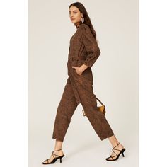 Multicolor animal print cotton (100% cotton). Jumpsuits. V-neck. Long sleeve. Front button closure. 57" from shoulder to hemline. Imported. Printed Long Sleeve Jumpsuit For Fall, Printed Long Sleeve Jumpsuits And Rompers For Fall, Printed Jumpsuits And Rompers For Fall, Cotton V-neck Jumpsuit For Work, Brown Cotton Jumpsuits And Rompers For Work, Relaxed Fit Brown Jumpsuits And Rompers For Fall, Spring Leopard Print Jumpsuits And Rompers, Chic Cotton Jumpsuits And Rompers For Fall, Chic Long Sleeve Cotton Jumpsuits And Rompers