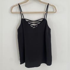 Super Simple And Elegant. Can Be Casual, Fancy, Corporate, Or Edgy! Never Worn Before! Black Strap Top For Spring, Casual Black Tops With Straps, Elegant Black Tops With Straps, Black Strappy Tops For Party, Casual Strappy Top For Night Out, Black Party Tops With Straps, Elegant Strappy Tops For Night Out, Black Strappy Party Tops, Black Strappy Tank Top For Night Out