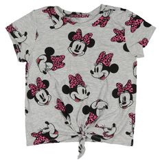 This Disney Minnie Mouse T-Shirt is a delightful blend of style and comfort for young fans. The shirt features an eye-catching all-over print of Minnie Mouse adorned with a chic pink leopard-patterned bow, adding a touch of wild flair to the classic character. The vibrant design captures Minnie’s playful spirit, making it a fun addition to any wardrobe. The tie-front detail at the hem adds a trendy twist, allowing for a customizable fit that’s both stylish and practical. Made from soft, breathab Fun Pink Minnie Mouse Top, Cute Minnie Mouse T-shirt For Summer, Disney Minnie Mouse Summer Tops, Casual Pink Minnie Mouse Top, Playful Spring T-shirt With All Over Print, Playful Minnie Mouse Crew Neck Top, Casual Minnie Mouse T-shirt For Spring, Pink Disney Tops For Summer, Minnie Mouse Crew Neck Top