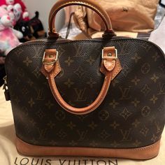 Pre Owned Items Shows Sign Of Wears Watermarks And Rubbings On The Vachetta, Handle Is Lightly Brown, Zipper Is Tarnished Inside Clean No Peeling No Smell No Stickiness And No Stains Overall In Good B- Vintage Condition. Please See Pic Or Send Message For More Information. Bags Louis Vuitton, Vintage Color, Brown Canvas, Vintage Colors, Louis Vuitton Bag, Send Message, Bag Lady, Louis Vuitton, Monogram