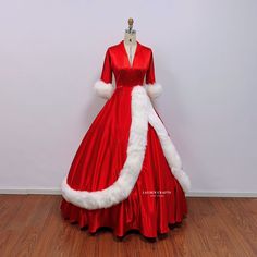 a red dress with white fur on it