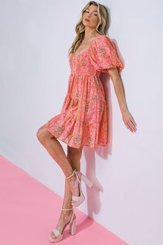 The Darling Daze Woven Mini Dress is crafted with eye-catching prints and premium fabrics. With a U neckline and short puff sleeves, it boasts a flattering fit. The smocked bodice and tiered skirt offer a graceful silhouette, making this dress the perfect choice for special occasions. Details Self: 100% Polyester Lining: 100% Polyester Size & Fit - Model is 5`8" And Wearing Size Small - Measurements Taken From Size Small - Approx. Length: 34” Feminine Pink Puff Sleeve Dress With Smocked Bodice, Feminine Short Sleeve Mini Dress With Smocked Bodice, Feminine Short Sleeve Smocked Bodice Mini Dress, Pink Puff Sleeve Dress With Smocked Bodice For Brunch, Pink Puff Sleeve Mini Dress With Smocked Back, Pink Mini Puff Sleeve Dress With Floral Print, Pink Floral Print Mini Puff Sleeve Dress, Pink Mini Dress With Smocked Bodice, Pink Puff Sleeve Dress With Smocked Back