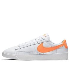 (WMNS) Nike Blazer Low LE 'White Fuel Orange' AV9370-103 (SNKR/Retro/Skate/Casual/Low Top/Women's) Retro White Skate Shoes For Streetwear, Summit White Low-top Casual Sneakers, Retro Skate Shoes With White Sole For Spring, Nike Casual Skate Shoes, Nike Casual Skate Shoes With White Sole, Casual Nike Skate Shoes With White Sole, Classic Nike Sneakers For Spring, Classic Skate Shoes With Gum Sole For Spring, Classic White Lace-up Skate Shoes