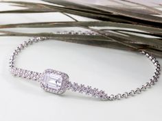 💎 Add a touch of luxury to your look with our Diamond-Style Baguette Gemstone Silver Bracelet! 💎 Featuring exquisite baguette gemstones reminiscent of diamond brilliance, this bracelet is crafted from high-quality 925 sterling silver. Its elegant design mimics the sophistication of fine jewelry, making it a stunning accessory for both everyday wear and special occasions. Whether you're treating yourself or searching for the perfect gift, this bracelet promises to dazzle and delight. ✨ Baguette Gemstone, Bracelet Elegant, Diamond Fashion, 925 Sterling Silver Jewelry, Chain Link Bracelet, Sterling Silber, Link Bracelets, Chain Link, Favorite Jewelry