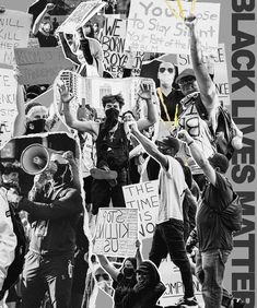 black and white photograph of protestors holding signs