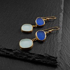 💍 Product features: Paros - Handmade Goldplated 18k Dangle & Drop Earring, with Blue or Light Blue - Yellow Natural Sea Glass. Hooks are made from Sterling silver 925 100% Handmade jewelry by Onos kosmima. ❓ A brief story: Every year, especially in the summer, I collect sea Glasses from my favorite beaches and I make the most beautiful jewelry, such as rings, earrings and pendants. All the glasses are naturally sculpted from the sea with time having a wise effect on them. ⚠ An advice: We recommend don't come your jewelleries into contact with chemicals such as perfumes, moisturizing creams , hair dyes . Also,you should not combine your jewelleries with physical activities like gymnastics,swimming etc. When your precious are not in use,please place them in a box without moisture!So it will Handmade Blue Long Drop Jewelry, Blue Long Drop Earrings For Gifts, Most Beautiful Jewelry, Paros, Drop Earring, Moisturizer Cream, Sea Glass, Beautiful Rings, Silver 925