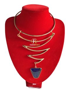 well designed African Brass necklace. Elegant Blue Metal Choker, Adjustable Metal Jewelry With Unique Design, Metal Choker Jewelry Set As Gift, Metal Choker Jewelry Set Gift, Fashion Pendant Clavicle Chain Jewelry, Metal Choker Jewelry Set For Gift, Clavicle Chain Choker Jewelry, Party Jewelry With Unique Metal Design, Unique Design Metal Jewelry For Party