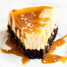 a piece of cheesecake with caramel drizzle on top