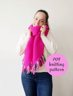 a woman wearing a pink knitted scarf with tassels on the ends and text overlay that reads, free knitting pattern