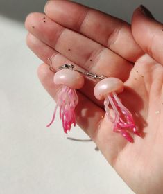 This Pink Jellyfish Earrings will be the perfect gift for an ocean lover. It has a shimmering pastel pink shade and was designed to make a statement. If you are searching for a Jellyfish Gift, then you have came to the right place! D E T A I L S: * Handmade Pink Jellyfish Dangle Earrings * Made from Polymer Clay * Drop Length: 2 inches (5 cm) * Color: Clear white and shimmering pink * Ear wire: Stainless steel * Earrings are light and easy to wear * Earrings arrive nicely packed in a eco friendl Handmade Pink Ocean-inspired Jewelry, Handmade Ocean-inspired Pink Jewelry, White Fish Hook Earrings As Gift, Jellyfish Jewelry, Jellyfish Earrings, Pink Jellyfish, Lover Earrings, Nautical Earrings, Fish Earrings