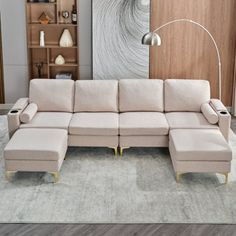 a living room with a large sectional couch