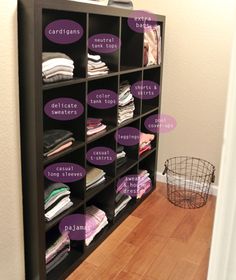 an organized closet is shown with labels on it