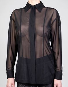 TECHNOCRACYBlack tulle dropped shoulder blouse w/ concealed press button fastening. 100% polyesterModel wears size SFront length: 68cmBack length (excl. collar): 74cmSleeve length: 49cmCuff: 7cmShoulder: 18,5cm Fall Blouse With Sheer Sleeves For Layering, Black Sheer Long Sleeve Shirt, Sheer Long Sleeve Shirt For Work, Chic Sheer Sleeve Blouse For Work, Sheer Long Sleeve Shirt For Fall, Sheer Mesh Top For Spring Workwear, Sheer Collared Tops For Fall, Fitted Sheer Shirt For Work, Fitted Sheer Shirt For Workwear