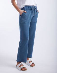 white-co-raw-edge-lounge-pant-denim-womens-clothing Casual Dark Wash Tapered Leg Bottoms, Casual Cropped Leg Denim Blue Pants, Comfortable Straight Leg Pants With Drawstring, Everyday Medium Wash Pants With Frayed Hem, Medium Wash Pants With Frayed Hem For Everyday, Casual Medium Wash Cargo Pants, Comfortable Straight Leg Bottoms With Drawstring, Relaxed Fit Mid-rise Pants With Drawstring, Relaxed Fit Mid-rise Drawstring Pants