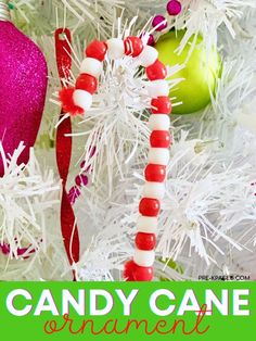 candy cane ornaments on a christmas tree with text overlay that reads, candy cane ornament