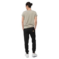 Well-made and lined with fleece, these comfortable Unisex Fleece Sweatpants will be your first choice for a casual everyday outfit--all you need to add is a graphic tee and sneakers to finish off the look.   * 100% cotton face  * 65% cotton, 35% polyester  * Charcoal Heather is 55% cotton, 45% polyester  * Tightly knit 3-end fleece  * 5-thread stitching  * Cuffed and side-seamed legs  * Elastic inside the waistband  * Flat drawstrings in a matching color  * 2 cross pockets in front  * 1 top-stitched patch pocket on the back of the right leg  * Ribbed waist, cuffs, and gusset at crotch  * Blank product sourced from PakistanSize guide   WAIST (inches) INSEAM LENGTH (inches) XS 28 28 S 30 29 M 32 30 L 34 31 XL 36 32 2XL 38 33 Cotton Athleisure Joggers With Side Pockets, Basic Sports Sweatpants With Pockets, Basic Sweatpants With Pockets For Sports, Casual Black Bottoms With Cozy Fit, Casual Cozy Fit Black Bottoms, Fleece Activewear With Side Pockets And Relaxed Fit, Cotton Sports Sweats With Side Pockets, Relaxed Fit Fleece Activewear With Side Pockets, Cotton Sweats With Side Pockets For Sports