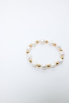 PG Designs Grace Bracelet Pearl like with Gold Beads Stretch Bracelet Can get wet Avoid chlorine and perfumes PG Designs Gold Stretch Bracelet, Bracelet Pearl, Gold Bead Bracelets, Pearl Design, Beaded Stretch Bracelet, Stretch Bracelet, Gold Beads, Pearl Bracelet, Stretch Bracelets