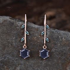 Product Detail Material: 925 Sterling Silver, 10k/14k/18k Solid Rose/White/Yellow Gold, Platinum Quantity: 2pcs (a pair) earrings Center Stone: 6x6mm Hexagon Cut Lab Blue Sandstone Side Stones: 1.5x3mm Marquise Cut Lab Alexandrites Custom Service 1, Gemstones can be replaced with others. 2, All metal can be customized. 3, The earrings can be customized according to the design you want. Please contact us if you need any personalized custom earrings. We will try our best to meet your needs. Only y Luxury Moss Agate Jewelry For Wedding, Moss Agate Jewelry, Blue Sandstone, Handmade Pendant Necklace, Future Engagement Rings, Moss Agate Ring, Agate Earrings, Agate Jewelry, Earrings Unique