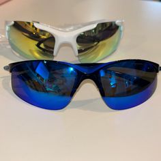 Brand New Sunglasses. Retails $19.99 Each Blue Casual Shield Sunglasses For Outdoor, Casual Blue Shield Sunglasses For Outdoors, Casual Blue Shield Sunglasses For Outdoor, Blue Shield Sunglasses For Summer Sports, Blue Sunglasses For Summer Sports, Blue Sunglasses For Sports In Summer, Blue Sports Sunglasses For Summer, Blue Polarized Shield Sunglasses For The Beach, Trendy Blue Shield Sunglasses For Outdoors